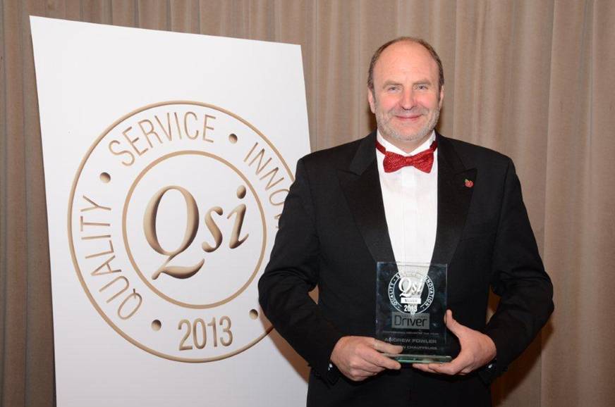 Andrew Fowler accepting his QSI Award