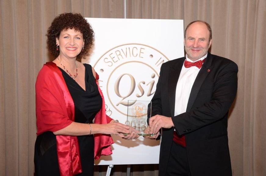 Jane and Andrew Fowler of Location Chauffeurs with their QSI Award